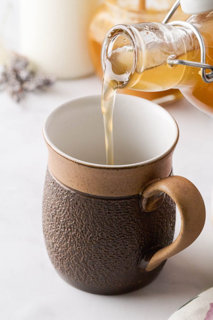 Honey Lavender Syrup being poured into a mug
