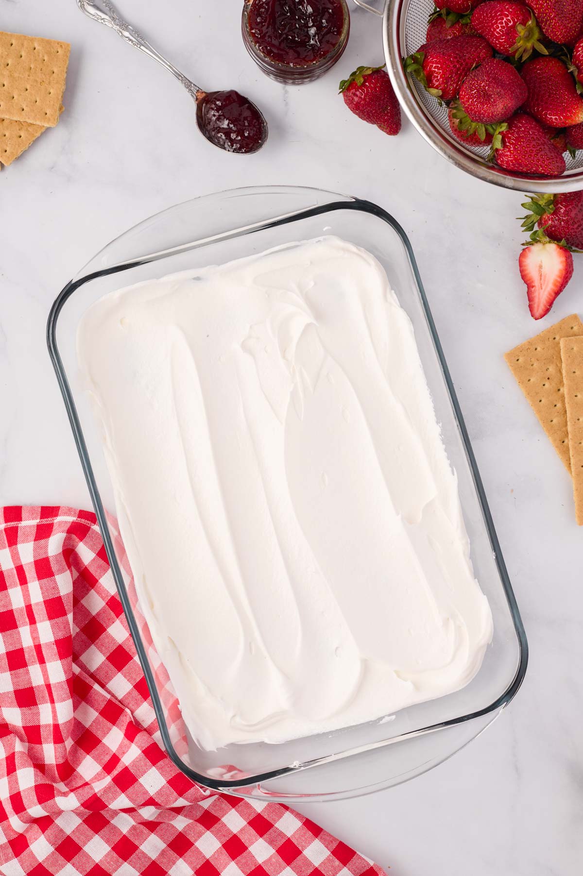 Layer of cool whip in a 9 x 13 baking dish
